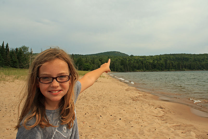 pointing up to bare bluff